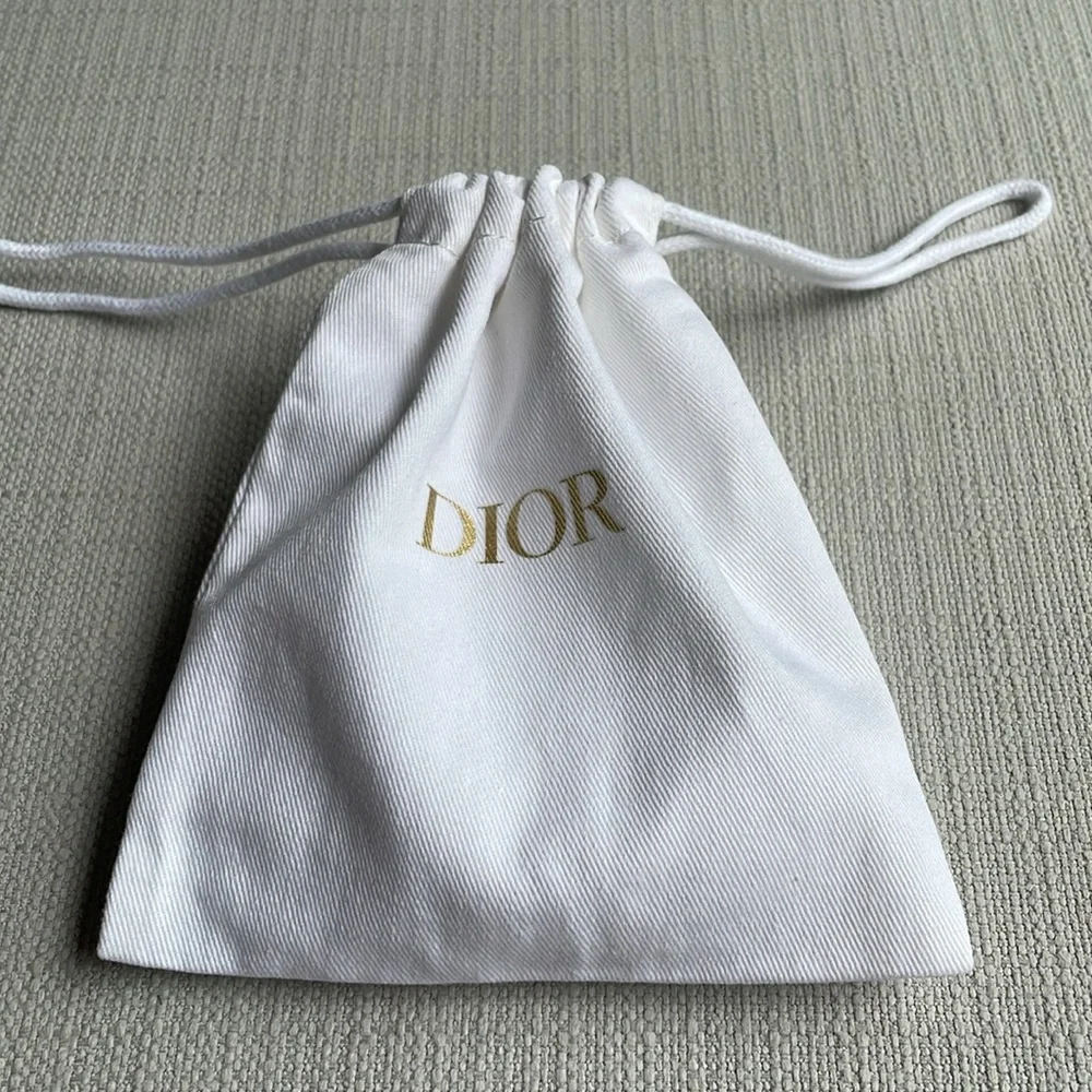 Dior prive luxury fragrance sampler with drawstring pouch